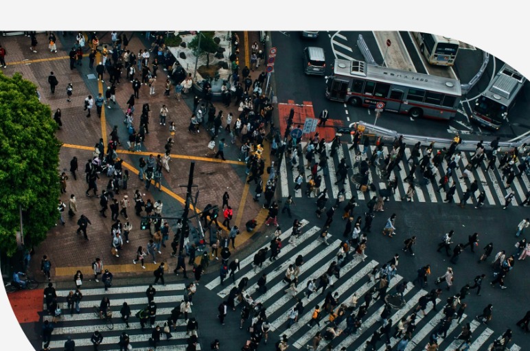 People crossing a city intersection